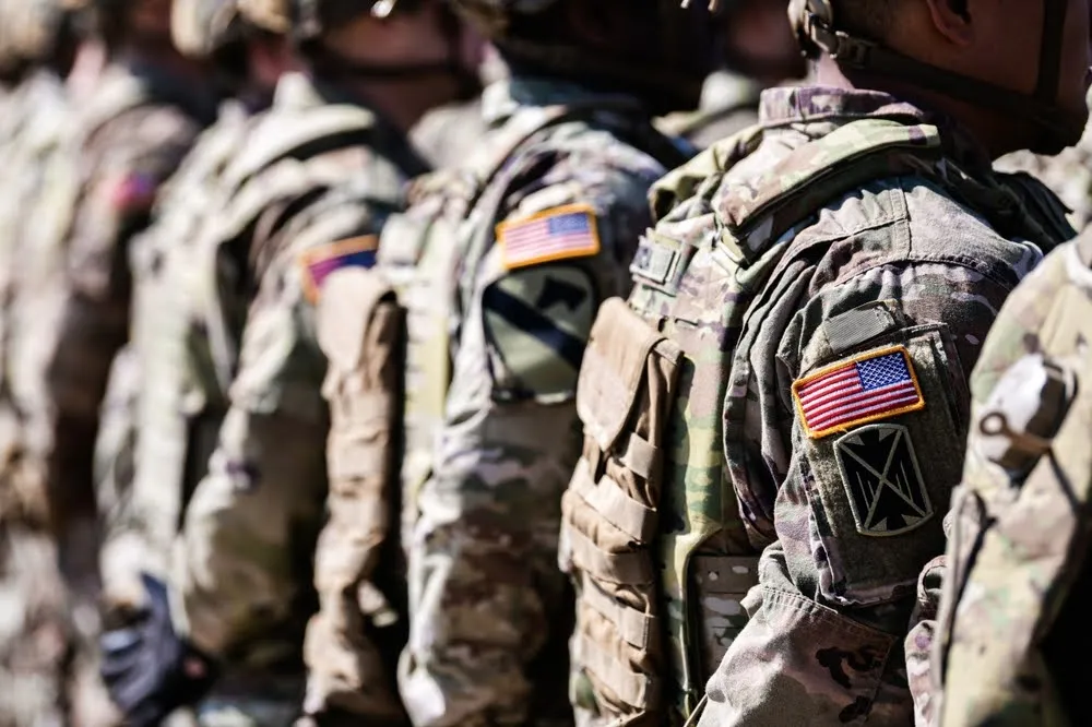 United States Army. Close up photo with the flag of America on soldiers shoulder uniform, US army concept image.