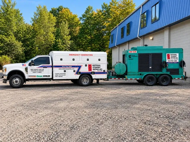 National Standby service truck towing a 300 kW Cummins rental generator