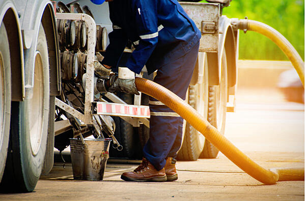 fuel polishing man pumping fuel standby generator maintenance